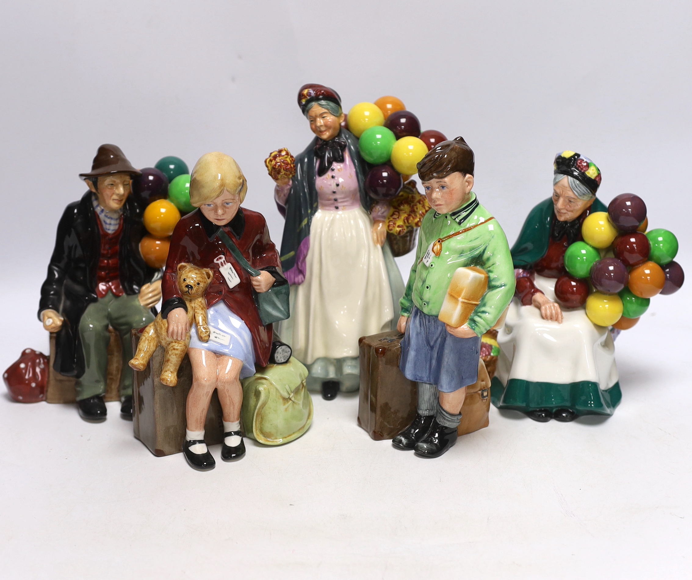 Royal Doulton figures: 'Girl Evacuee' and 'Boy Evacuee', 'The Old Balloon Seller', 'The Balloon Man', 'Diddy Penny Farthing', tallest 23cm high